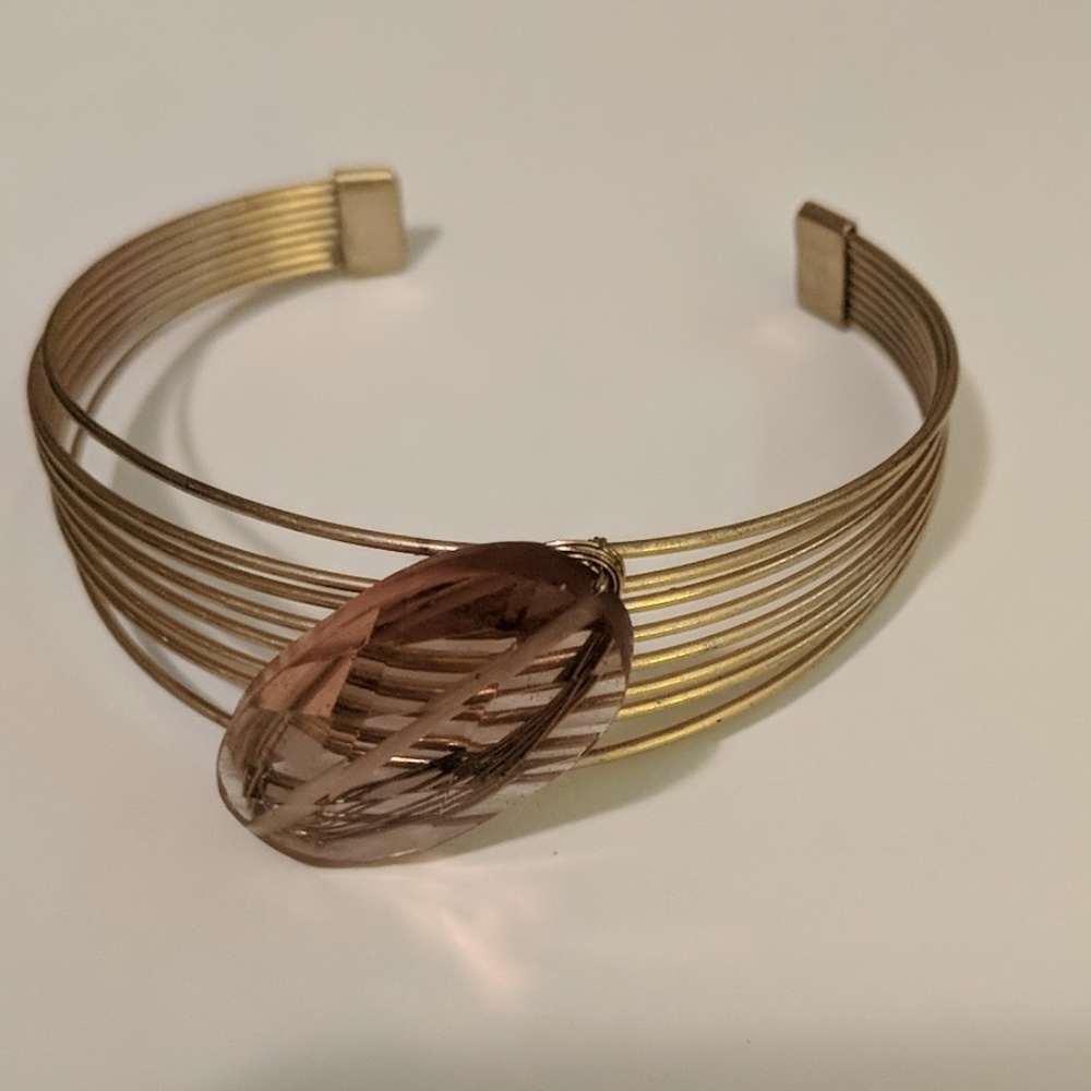 Gold cuff bracelet with Pale Amethyst bead